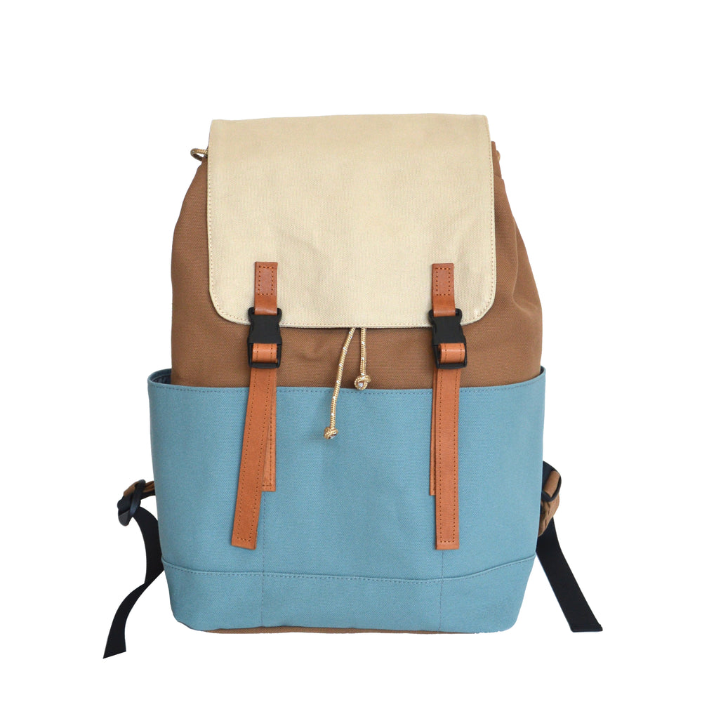 Backpack with beige top section and blue bottom section on a white background