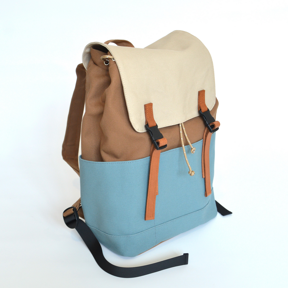 Backpack with brown and blue design on a white background