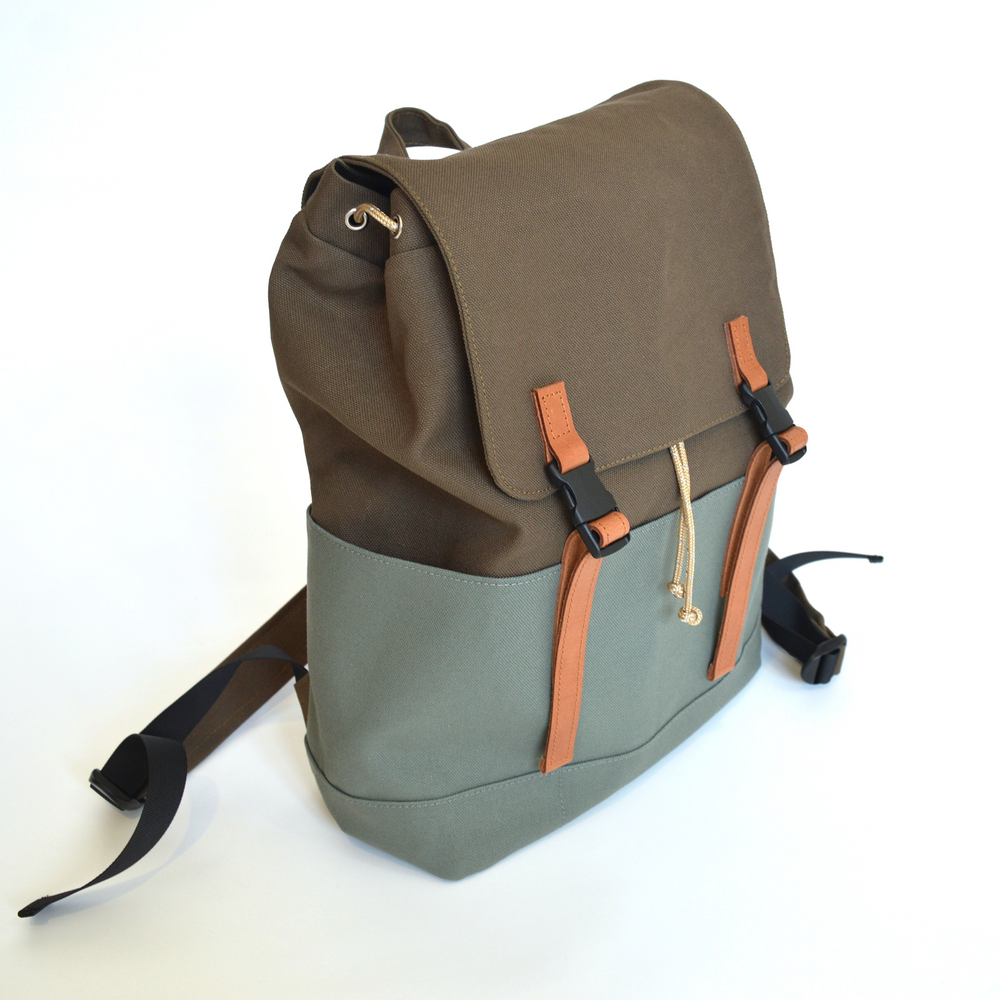 Two-tone backpack with brown top section and gray bottom section on a white background