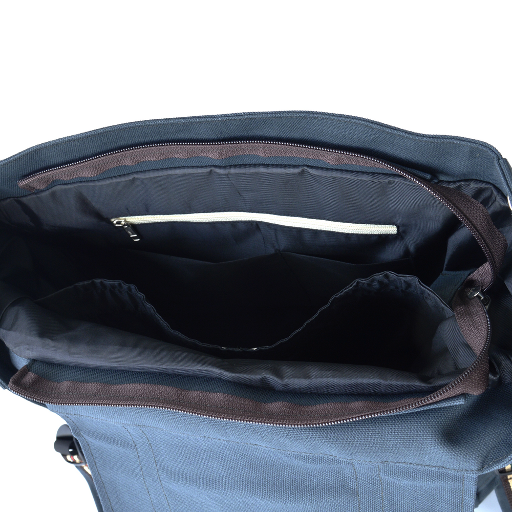 Open blue bag with a white interior on a white background