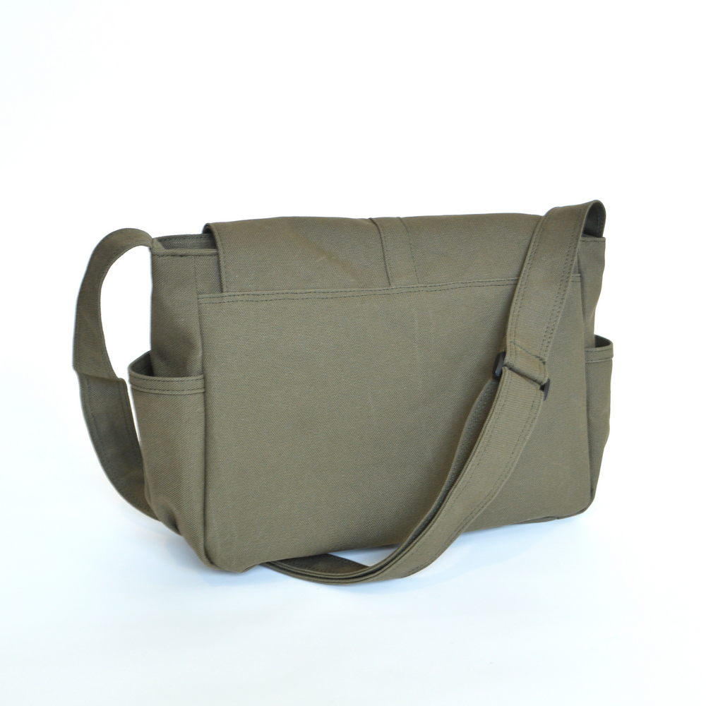 Green messenger bag on a white background