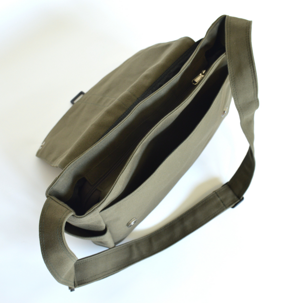 Green sling bag on a white background