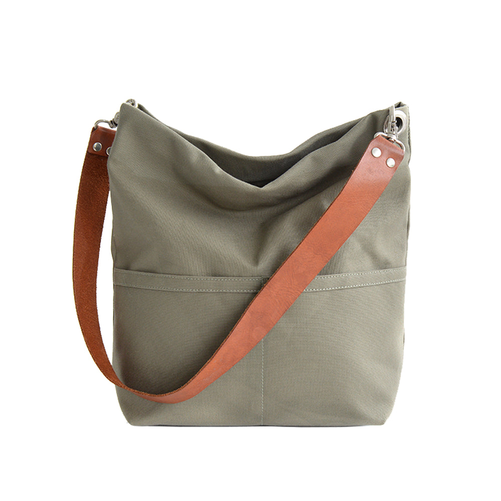 Olive Green shoulder bag with a brown strap on a white background.
