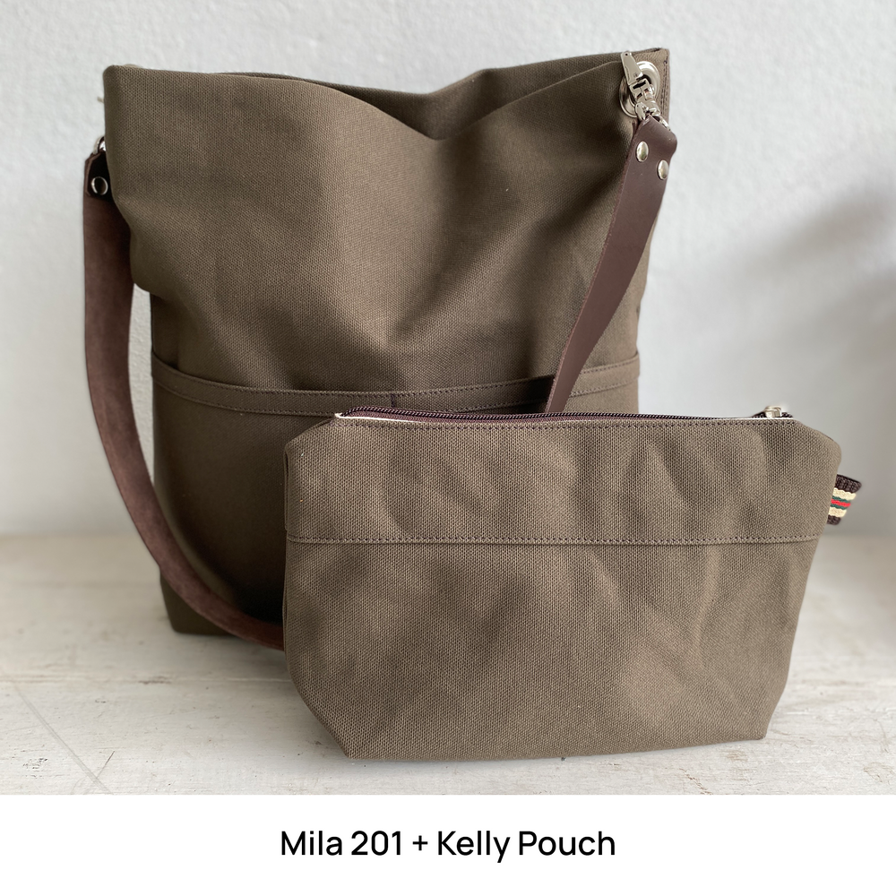 Brown tote bag and pouch on a light wooden surface with a white background