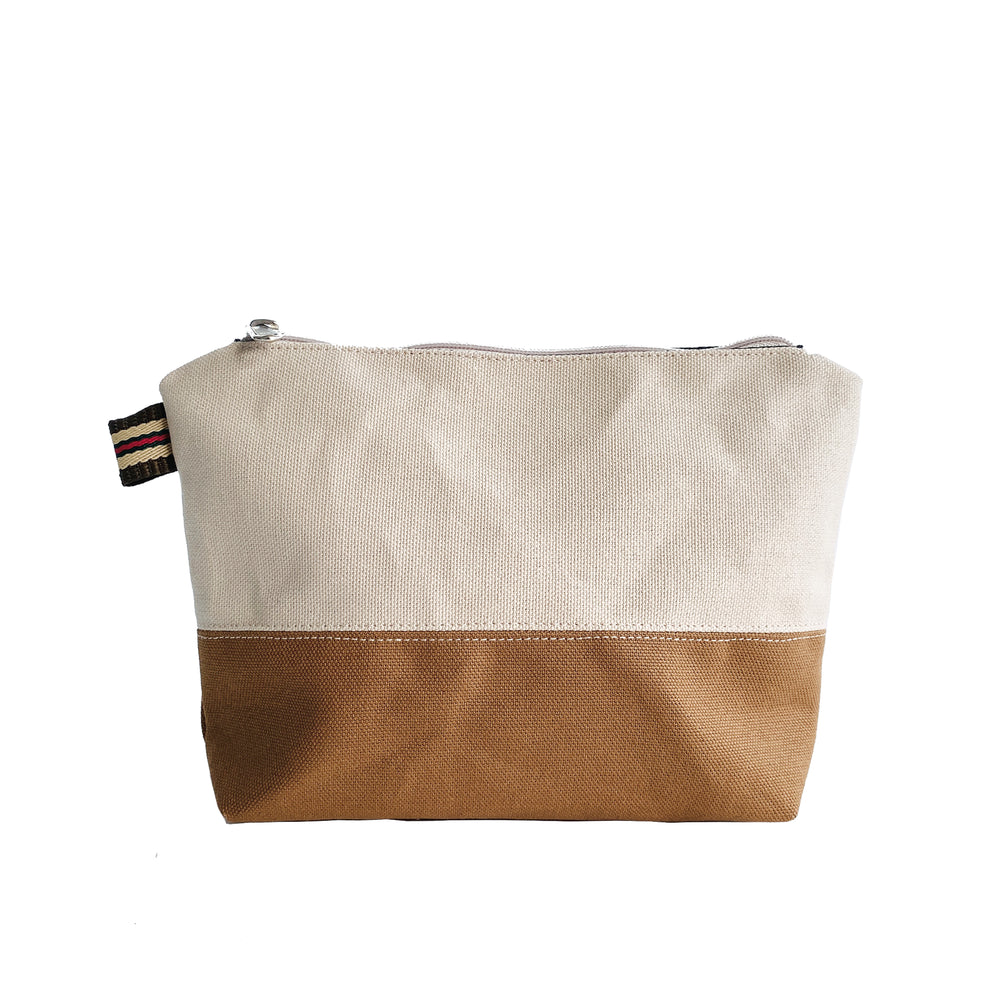 Two-tone beige and brown pouch with a zipper on a white background